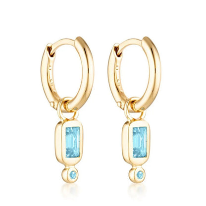 Linda Tahija - Raya Huggie Earrings, Blue Topaz - The Flower Crate